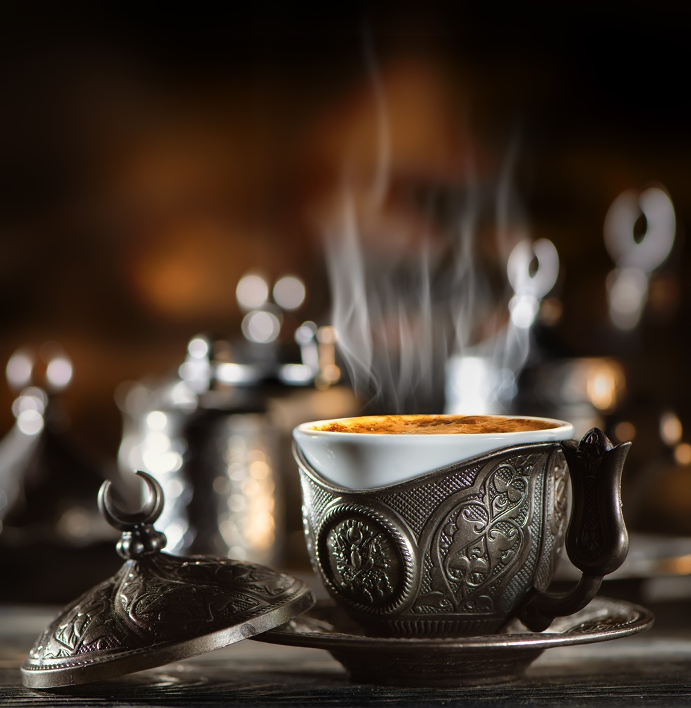 Michael Van Eaton related image showing detailed cup filled with coffee and visible steam
