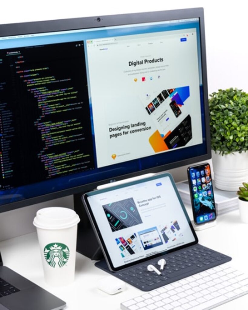 Michael Van Eaton related image showing a computer desk with modern digital devices